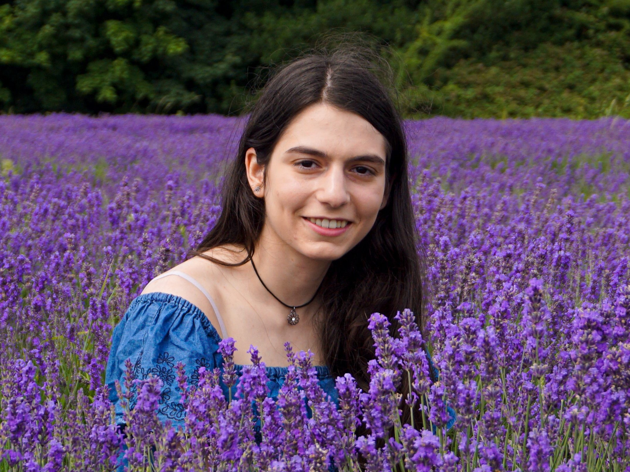 A girl in the middle of a lavender field