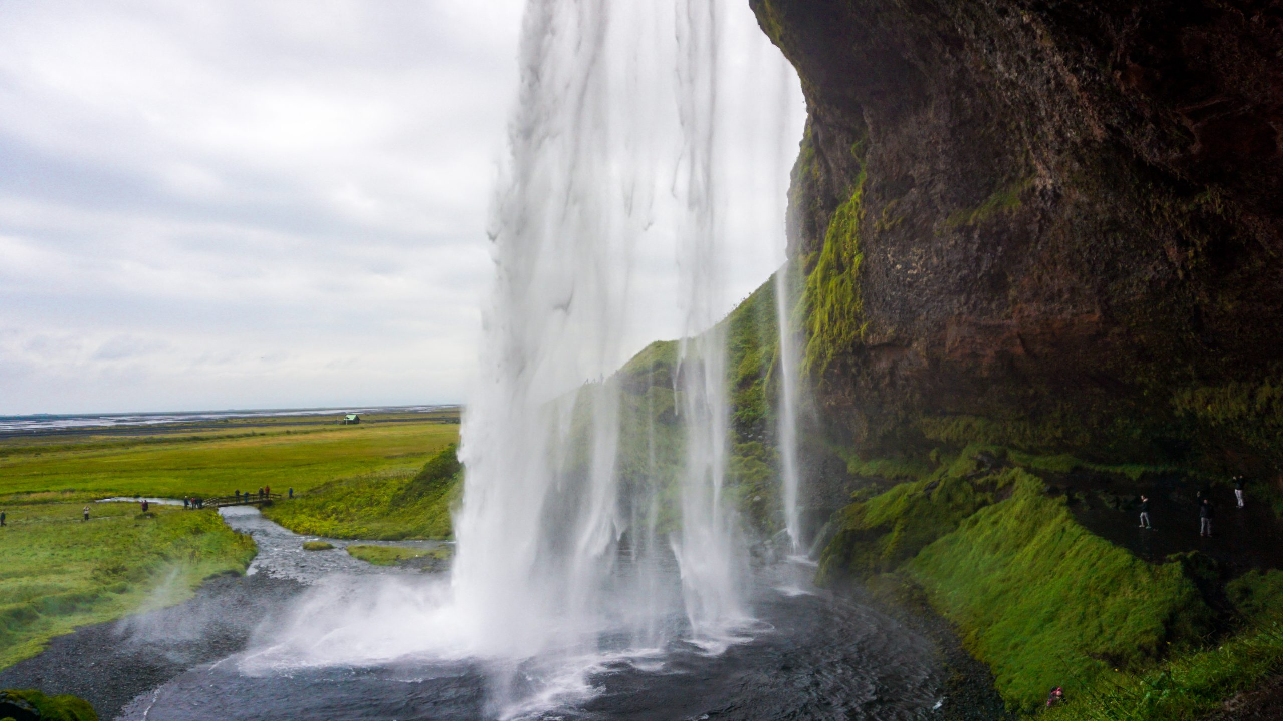 Water falling down from Seljalandsfoss waterfall