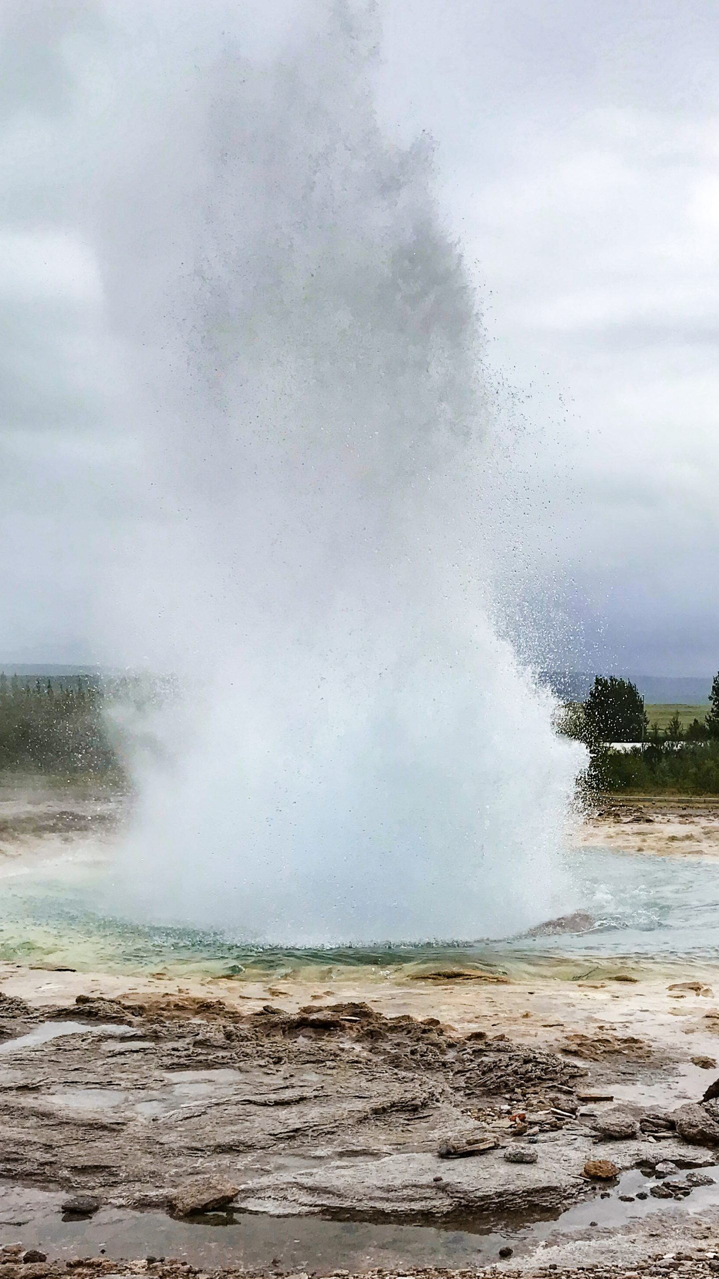 The Strokkur geyser in an erupted state